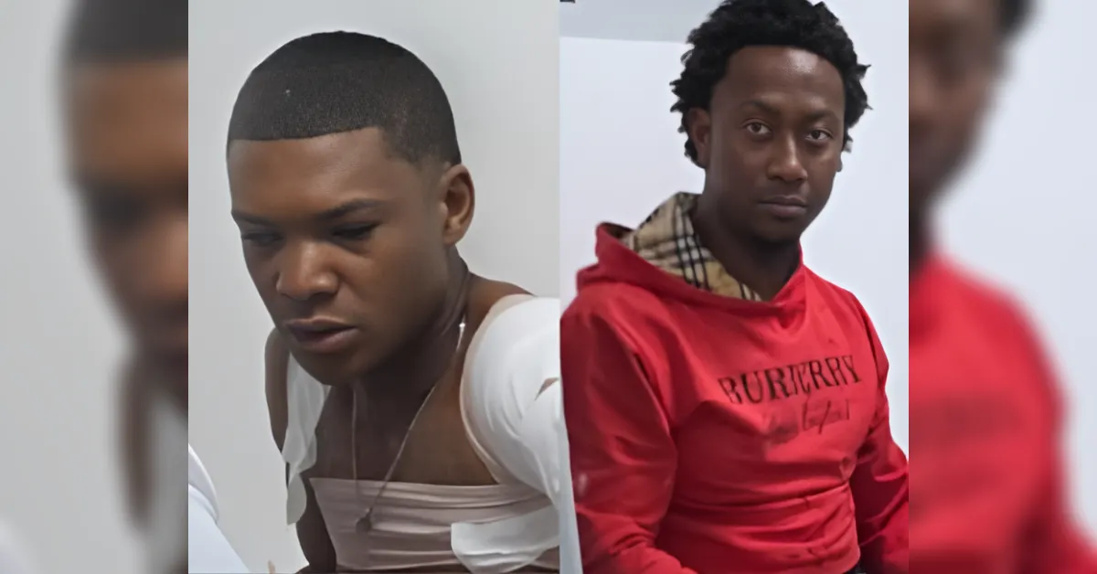 Two young Black men photographed side by side: left in a white sleeveless shirt looking down, right in a red Burberry hoodie facing the camera.