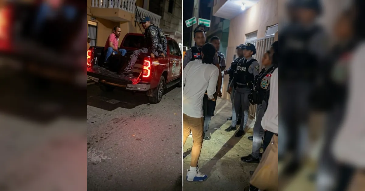 Nighttime street scene with police officers talking to civilians; a man in casual clothes sits on a pickup bed while another officer stands nearby in tactical gear.