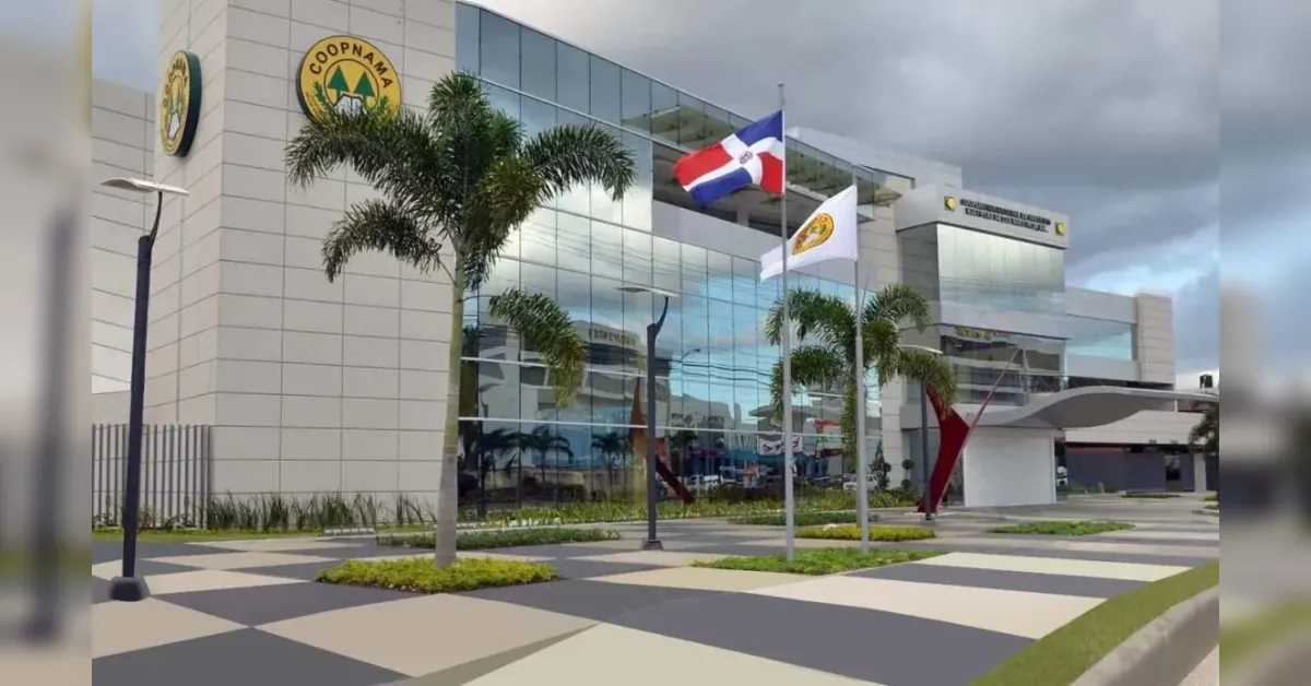 Modern corporate building with glass facade, palm trees, and flagpoles displaying a Panama flag and a white logo flag.