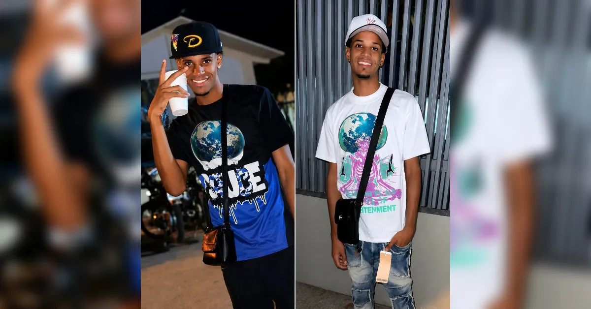 Two young men posing side by side in Earth-themed graphic tees with crossbody bags and caps.
