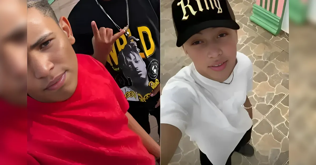 Two young people pose for a selfie: a person in red on the left and a person in white with a black cap on the right, with a third person making a hand gesture in the background.