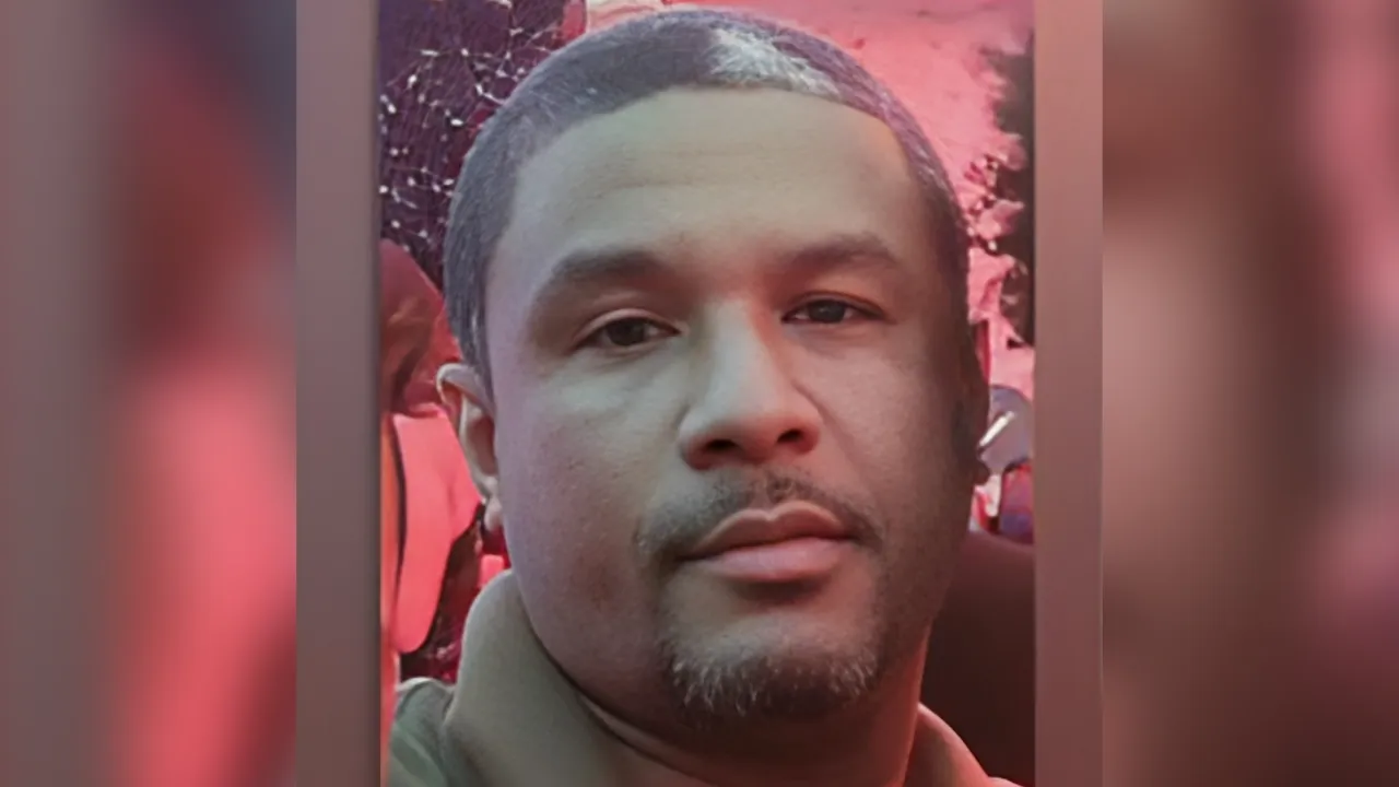 Close-up portrait of a man with short hair and a light goatee, looking at the camera.