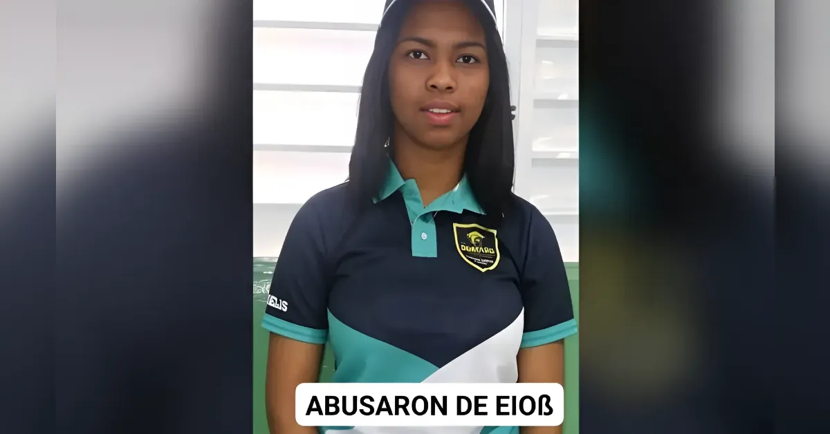 Teenage girl in a navy teal school polo with a crest, facing the camera indoors; bottom caption bar with text.