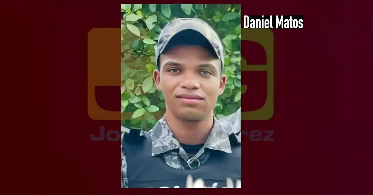 Portrai t of a young man in camouflage uniform and cap, outdoors with green leaves; 'Daniel Matos' text appears in the corner.