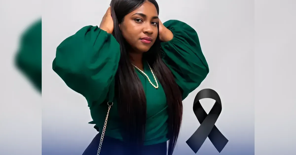 Portrait of a woman in a green puff-sleeve top posing against a light background, with a black awareness ribbon in the foreground.