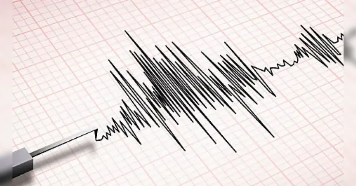 Seismograph readout with a jagged black line indicating ground motion on grid paper