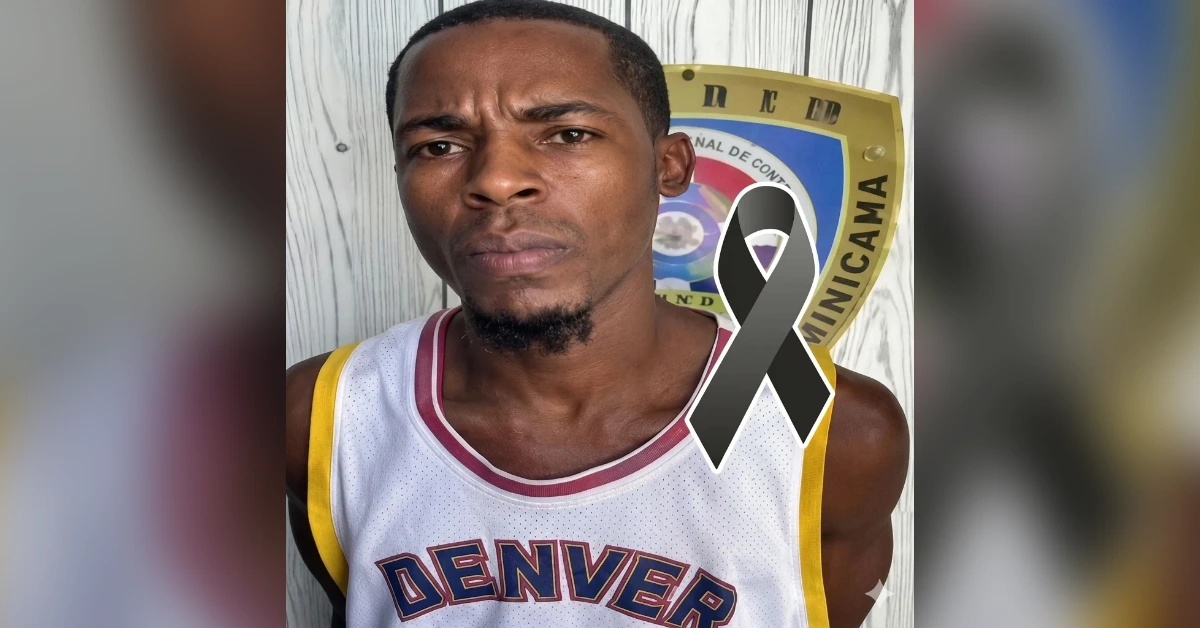 Man in a white Denver basketball jersey stands against a wooden wall; a black mourning ribbon is overlaid on the image, signaling remembrance.