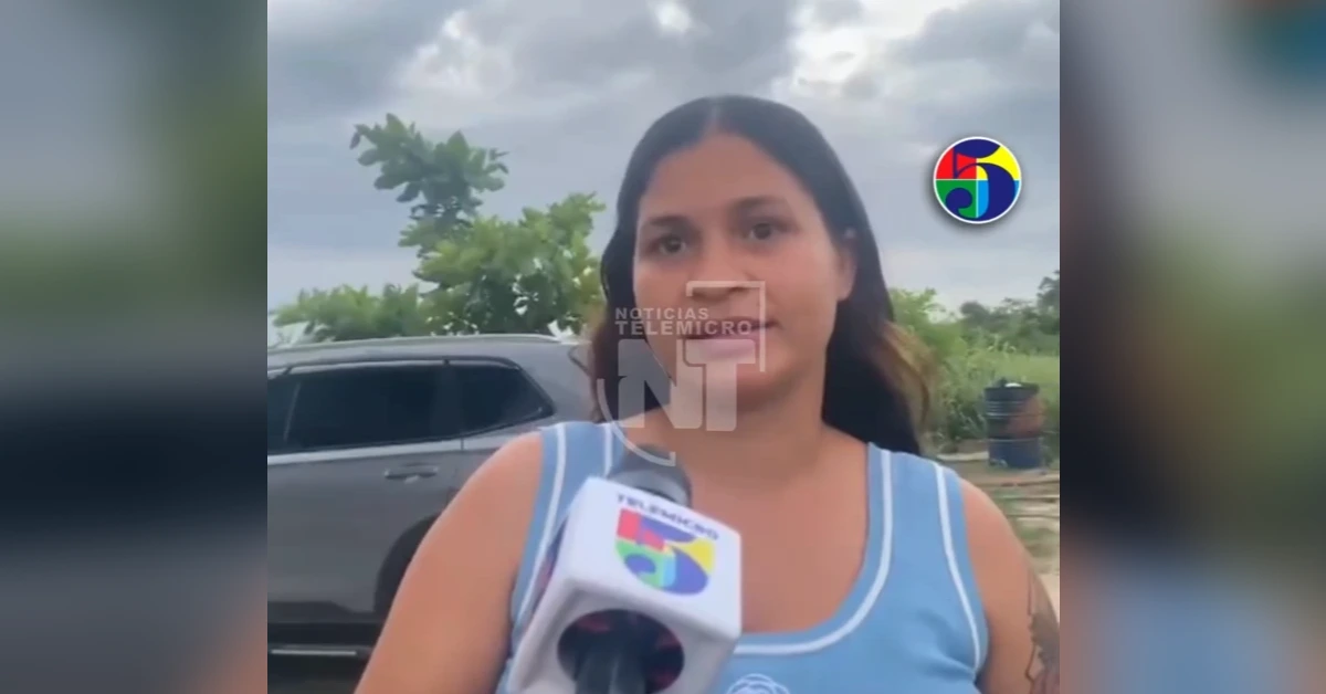 Woman being interviewed outdoors, holding a TeleMicro Noticias microphone with a colorful logo in front of her.