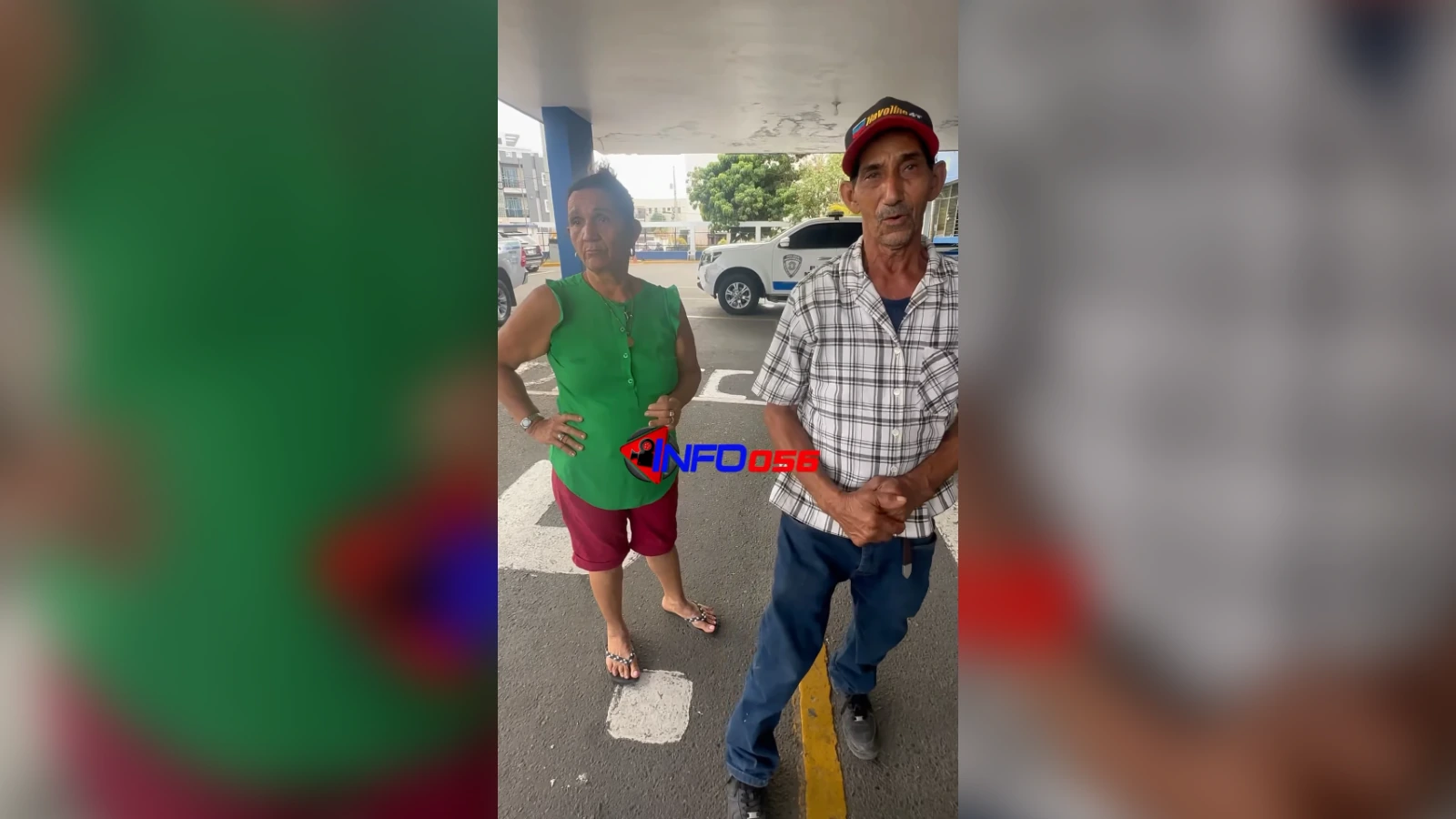Two older adults stand in a parking lot under a concrete canopy, a police SUV visible in the background, with 'INFO056' logo across the center.