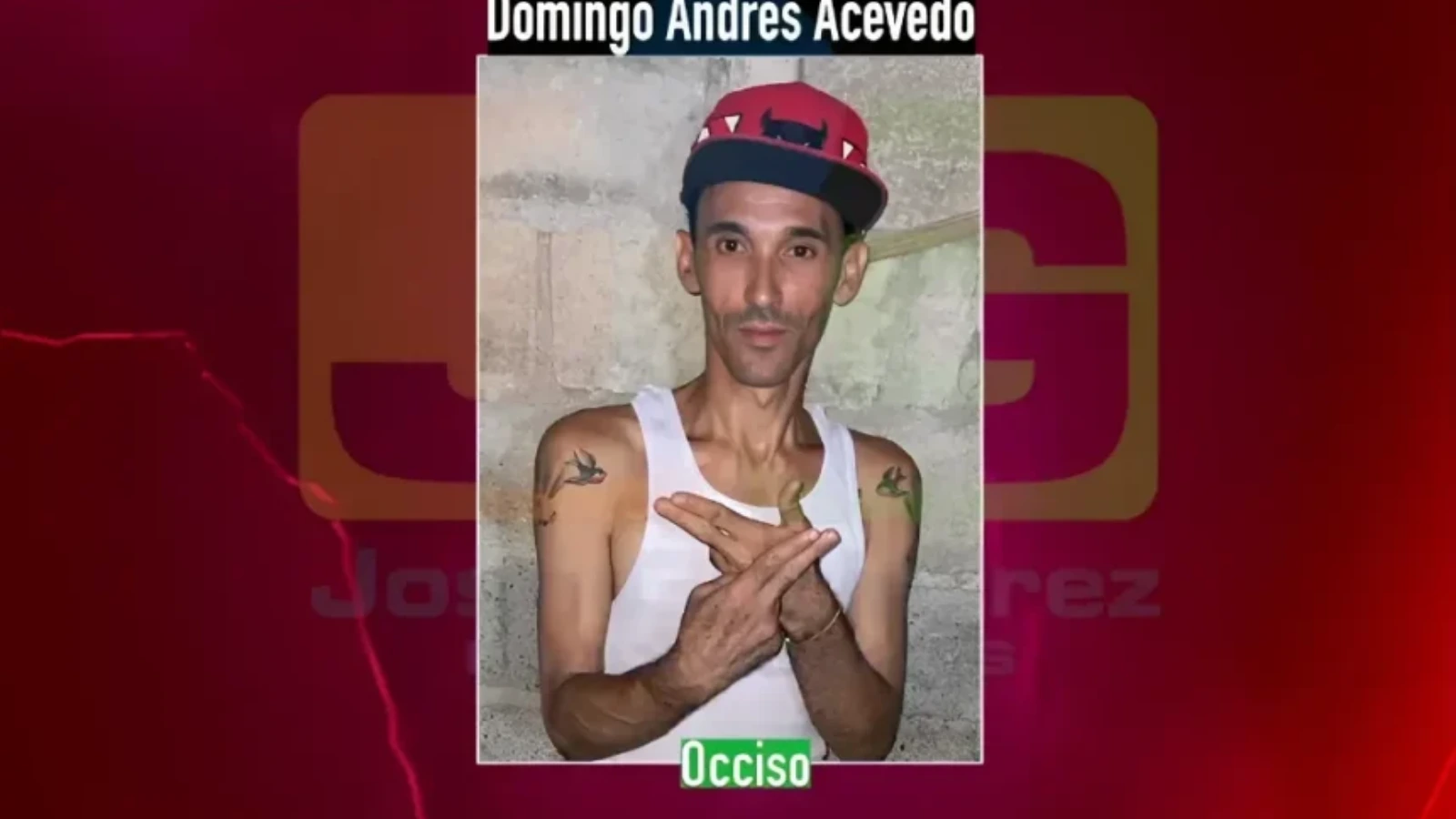 Portrait of a man wearing a white tank top and red cap, with tattoos on both arms, standing against a concrete wall; a caption reads 'Occiso' indicating he is deceased.